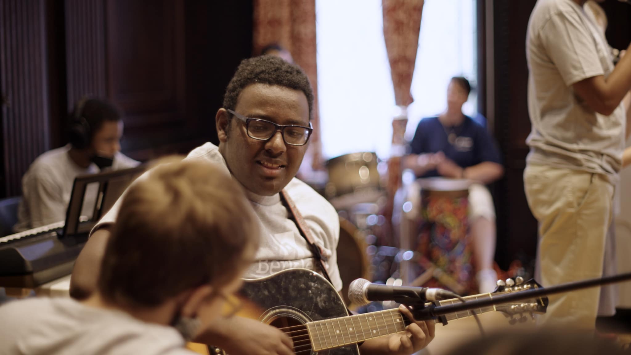 Students playing instruments at the Berklee Institute for Accessible Arts Education (BIAAE)