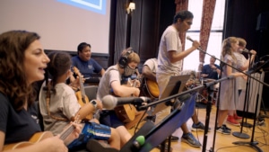 Students playing instruments at the Berklee Institute for Accessible Arts Education (BIAAE)